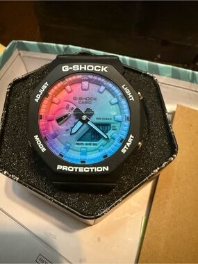 Casio G-SHOCK Warranty Card with Red and Blue Accents